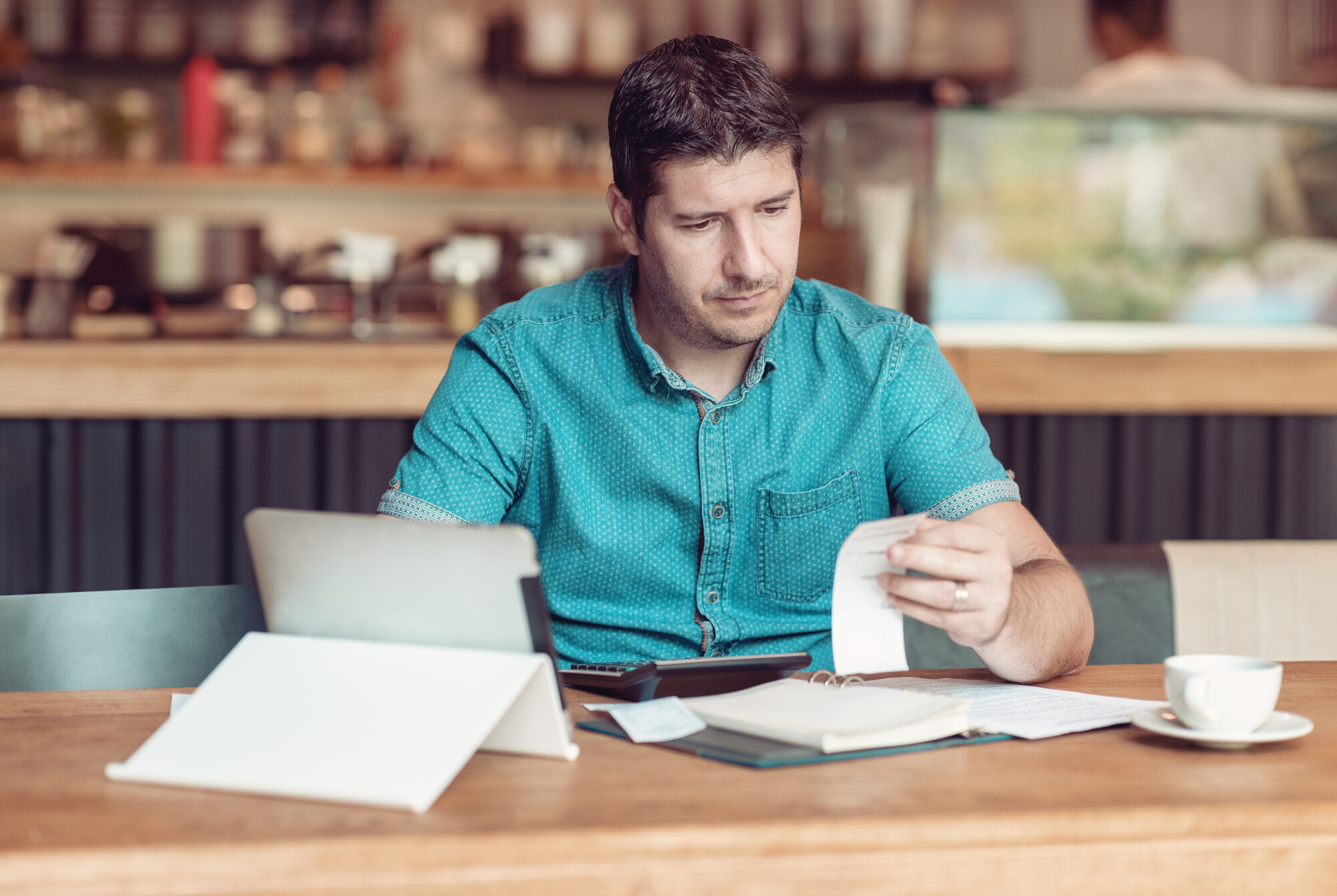 Worried Business Owner going through taxes