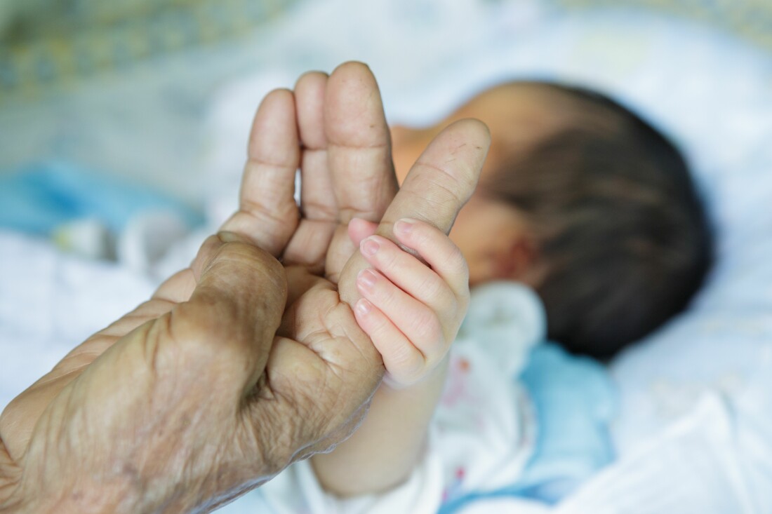 Baby Holding Grandmother's Hand