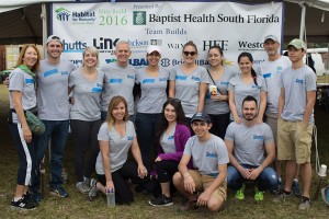 Shutts attorneys Michael Larmoyeux, Vanessa Septien, Don Wasil, Dana Chaaban, Christa Gardner, Melissa Patterer, Pilar Rubio, Larry Glick, and legal assistant Lizette Fernandez with their families at the 2016 Blitz Build. 