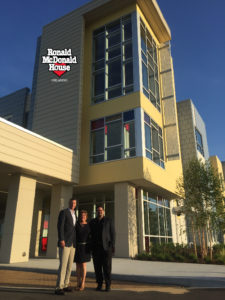 After donating the proceeds of his Father’s Day Golf Tournament, Eric Reed was invited to attend the grand opening. Eric (left), is pictured here with Lou Ann DeVoogd, Executive Director of RMH, and Jimmy Farrell of Cox Communications.