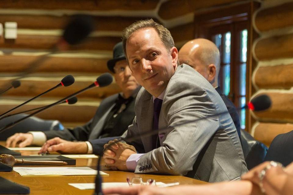 David Coviello listens during the town's re-opening ceremony. Photo credit: Matias J. Ocner, Miami Herald